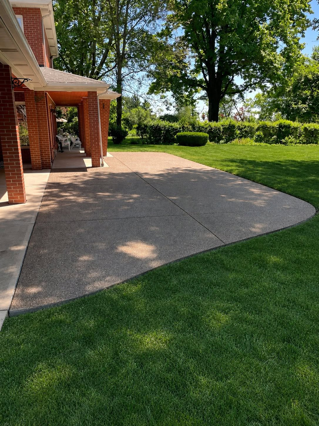 Large exposed aggregate patio